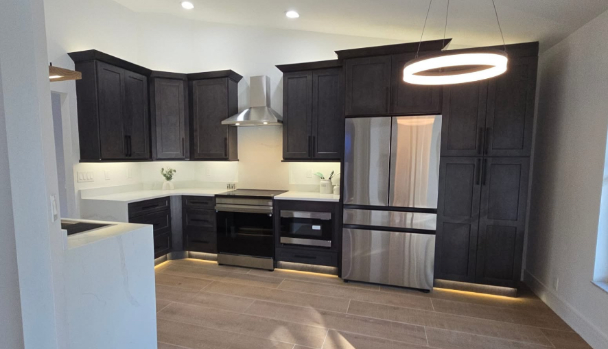 Kitchen remodel — custom cabinetry and ring pendant