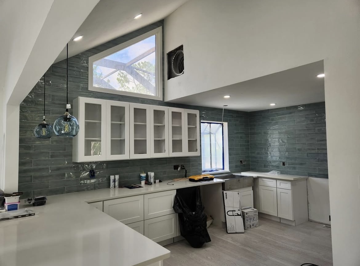 Kitchen remodel — glass tile backsplash and quartz counters